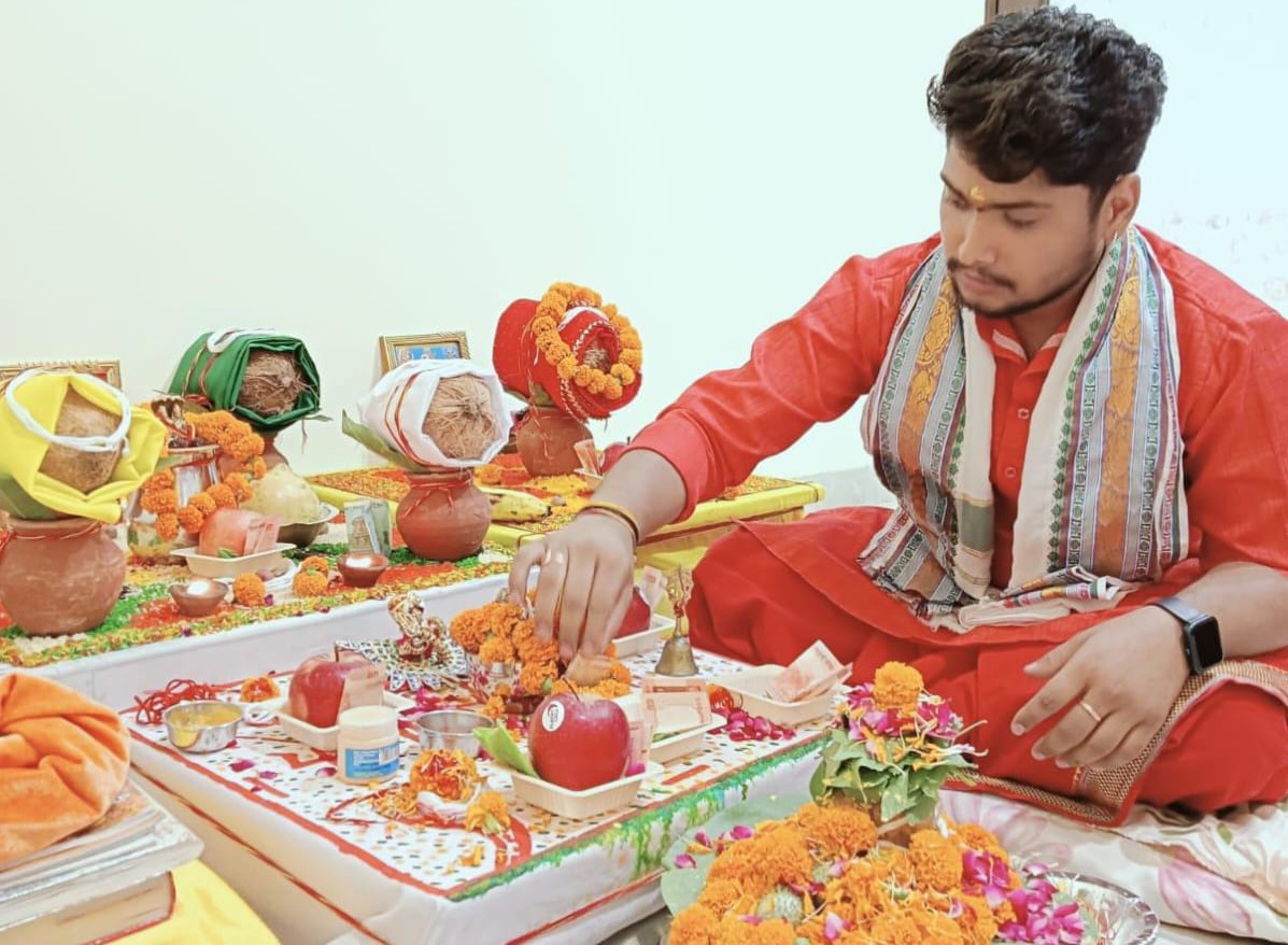 Conducting sacred puja ceremony